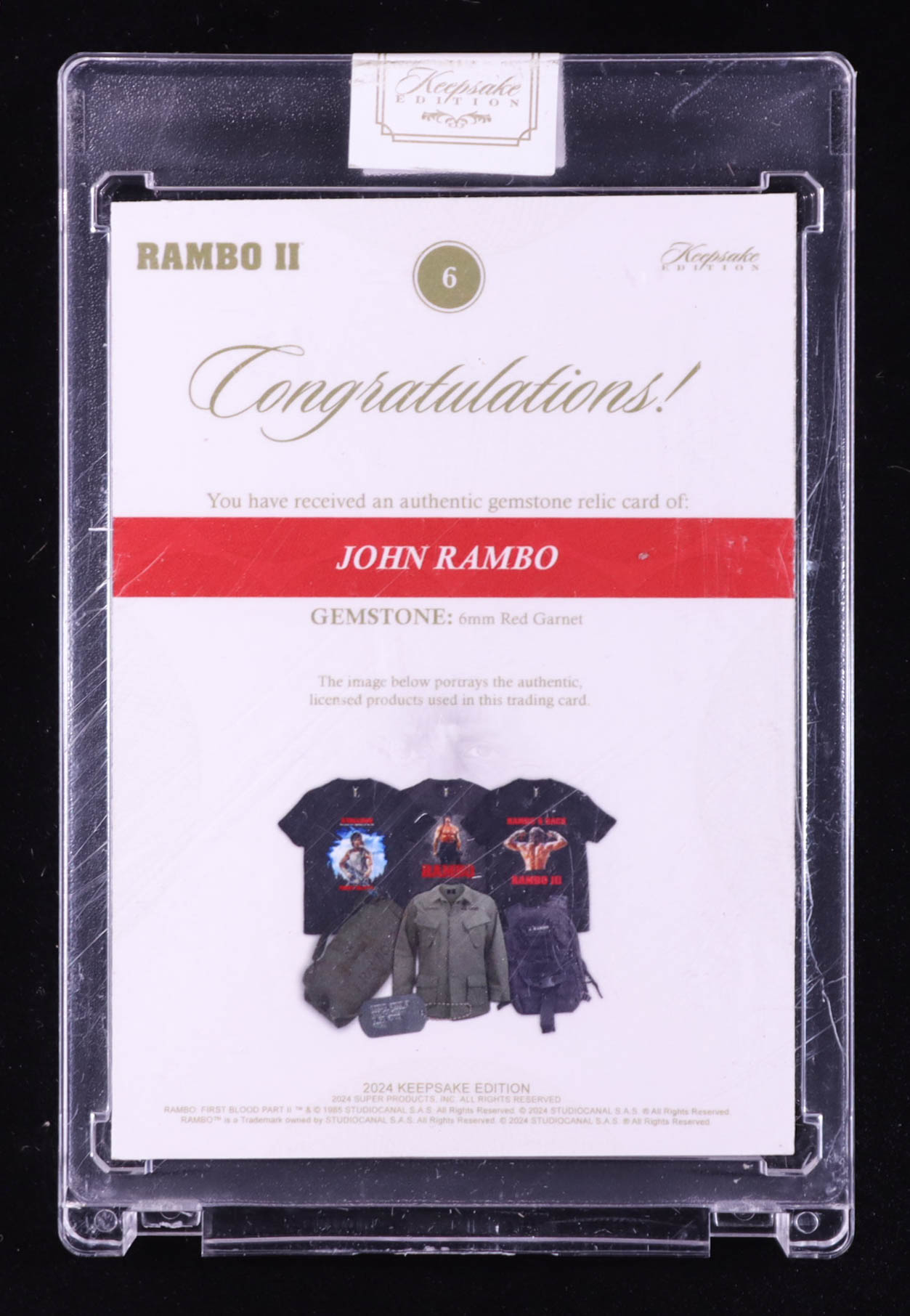 John Rambo 2024 Keepsake Edition Gemstone Relic Authentic Rambo II #6 #40/99 at PristineAuction.com John Rambo 2024 Keepsake Edition Gemstone Relic Authentic Rambo II #6 #40/99 at PristineAuction.com