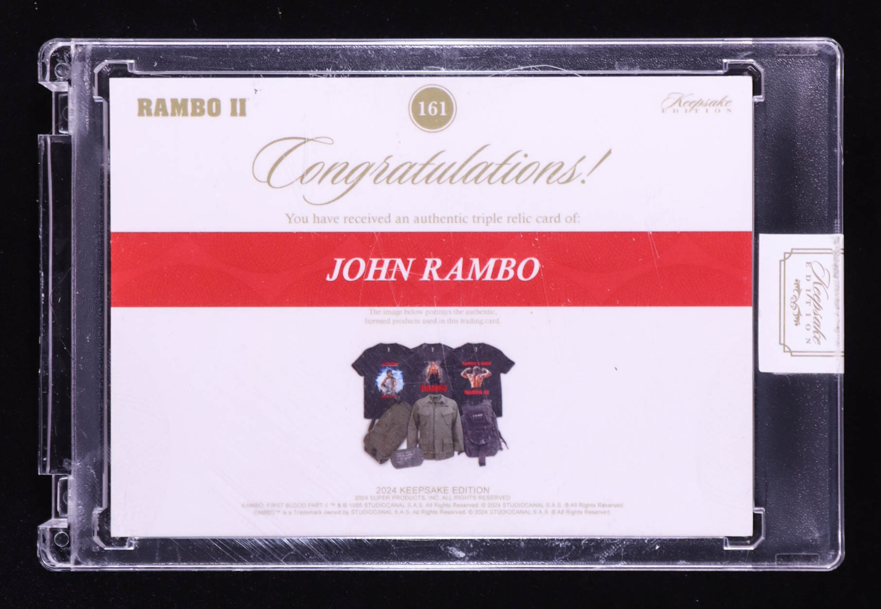 John Rambo 2024 Keepsake Edition Triple Relic Authentic Rambo II #161 #01/50 at PristineAuction.com John Rambo 2024 Keepsake Edition Triple Relic Authentic Rambo II #161 #01/50 at PristineAuction.com