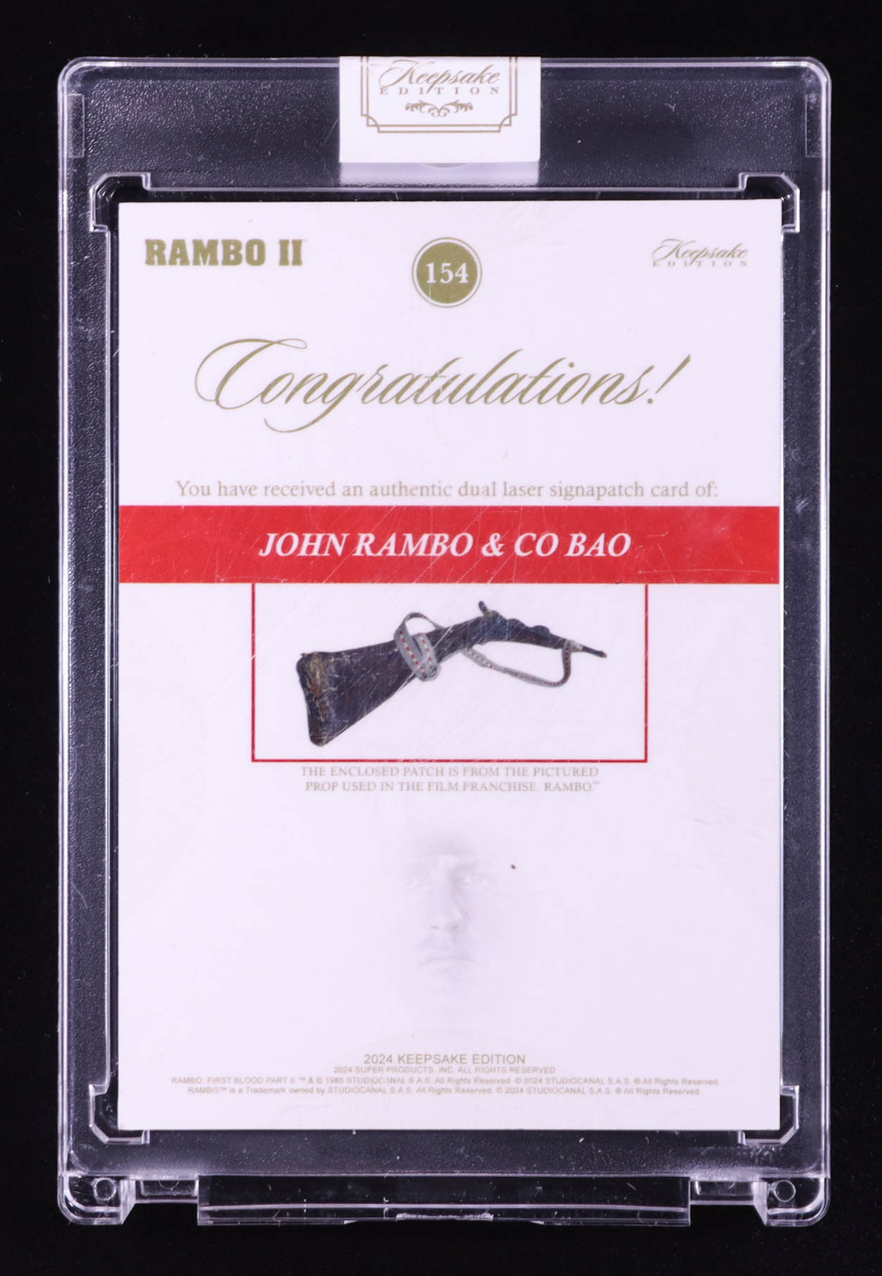 John Rambo/Co Bao 2024 Keepsake Edition Dual Laser Signapatch Authentic Rambo First Blood II #154 #16/50 at PristineAuction.com John Rambo/Co Bao 2024 Keepsake Edition Dual Laser Signapatch Authentic Rambo First Blood II #154 #16/50 at PristineAuction.com