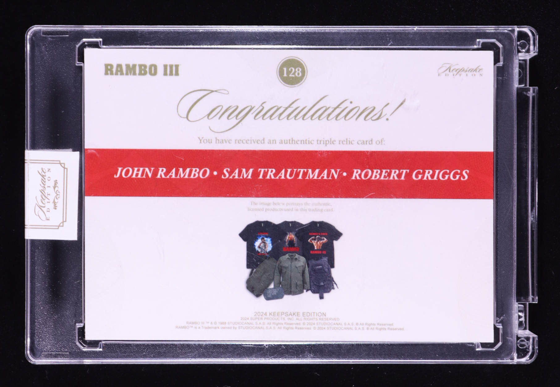 John Rambo/Sam Trautman/Robert Griggs 2024 Keepsake Edition Tri Cut Relics Authentic Rambo III #128 #21/50 at PristineAuction.com John Rambo/Sam Trautman/Robert Griggs 2024 Keepsake Edition Tri Cut Relics Authentic Rambo III #128 #21/50 at PristineAuction.com