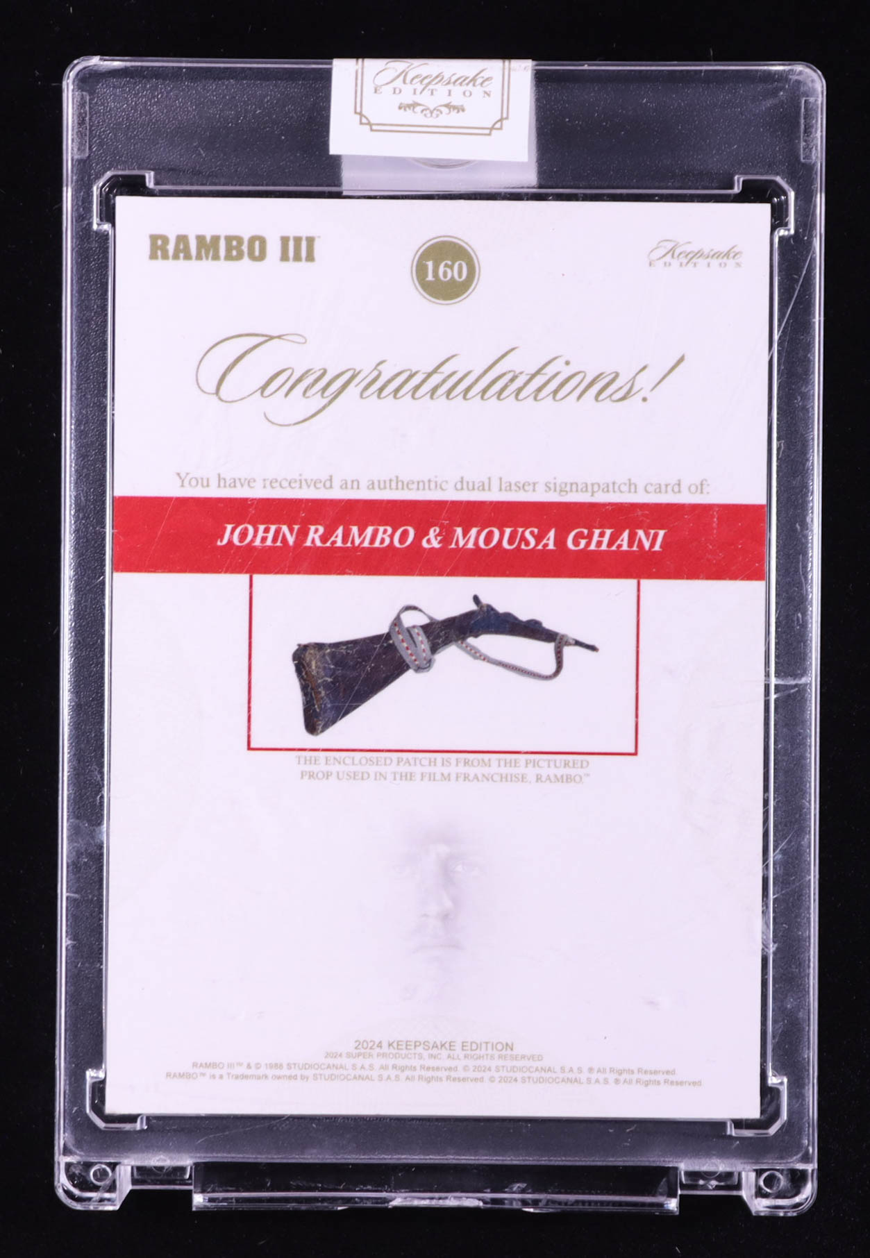 John Rambo/Mousa Ghani 2024 Keepsake Edition Dual Laser Signapatch Authentic Rambo III #160 #03/50 at PristineAuction.com John Rambo/Mousa Ghani 2024 Keepsake Edition Dual Laser Signapatch Authentic Rambo III #160 #03/50 at PristineAuction.com