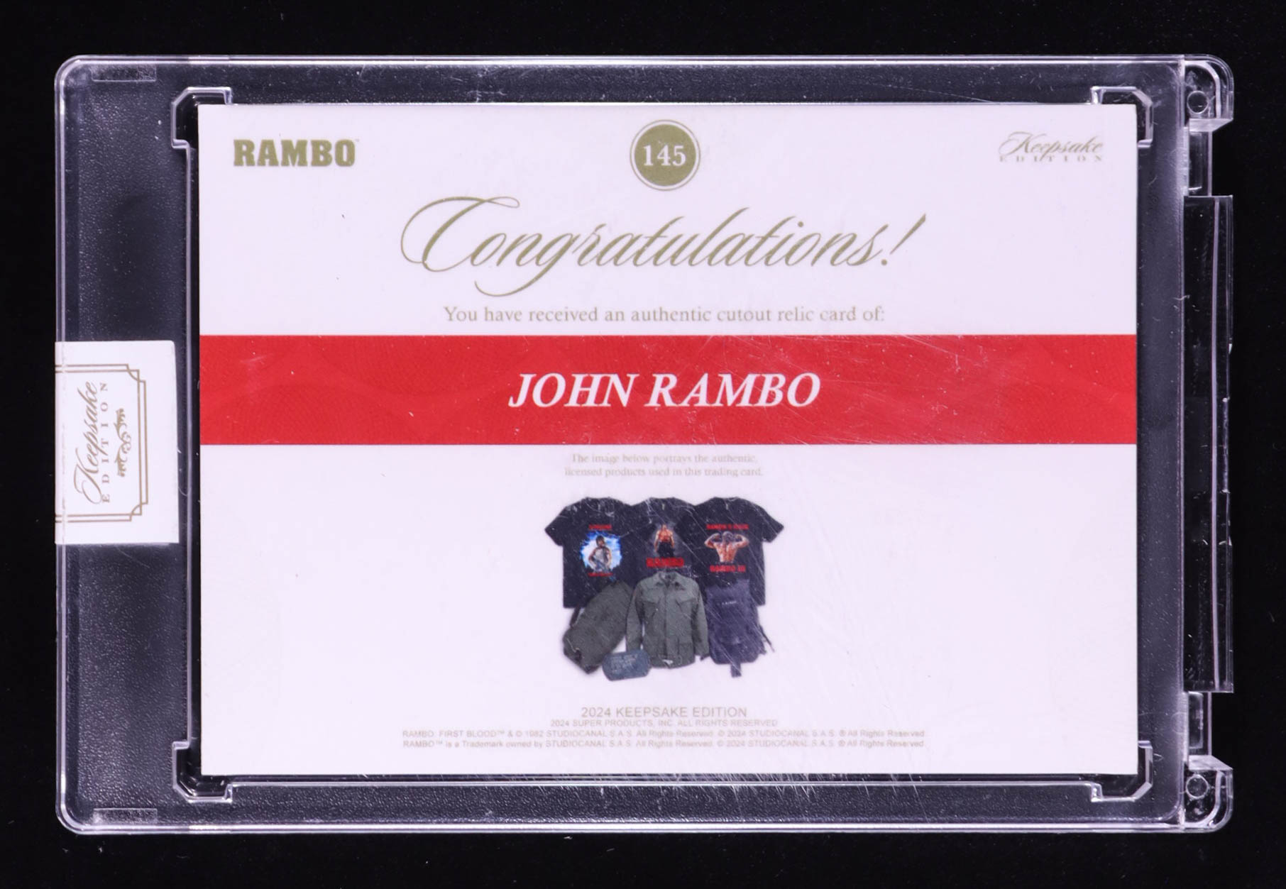 John Rambo 2024 Keepsake Edition Cutout Relic Authentic Rambo #145 #44/50 at PristineAuction.com John Rambo 2024 Keepsake Edition Cutout Relic Authentic Rambo #145 #44/50 at PristineAuction.com
