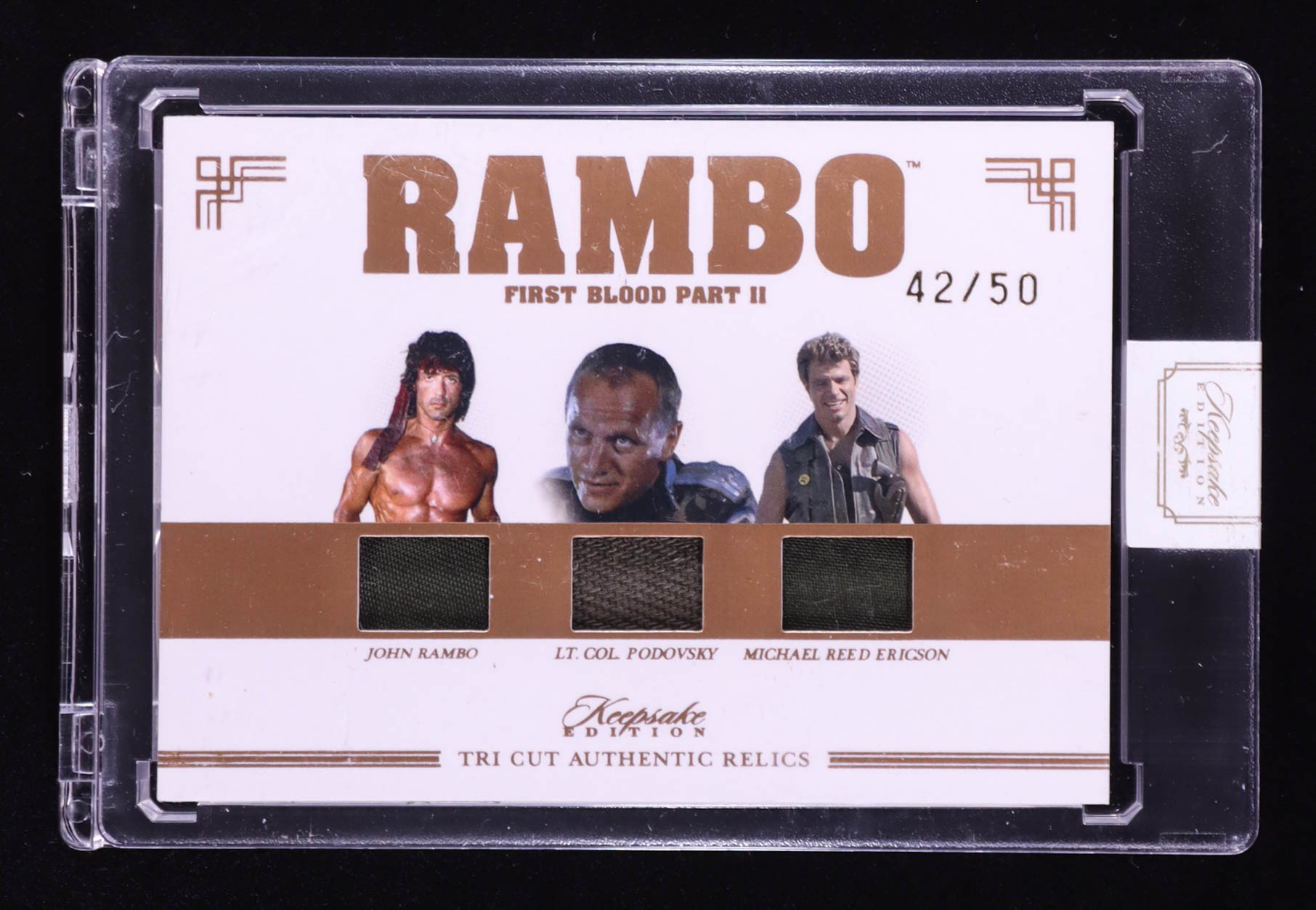 John Rambo/Michael Reed Ericson/LT. Col. Podovsky 2024 Keepsake Edition Triple Relic Authentic Rambo First Blood Part II #124 #42/50 at PristineAuction.com John Rambo/Michael Reed Ericson/LT. Col. Podovsky 2024 Keepsake Edition Triple Relic Authentic Rambo First Blood Part II #124 #42/50 at PristineAuction.com