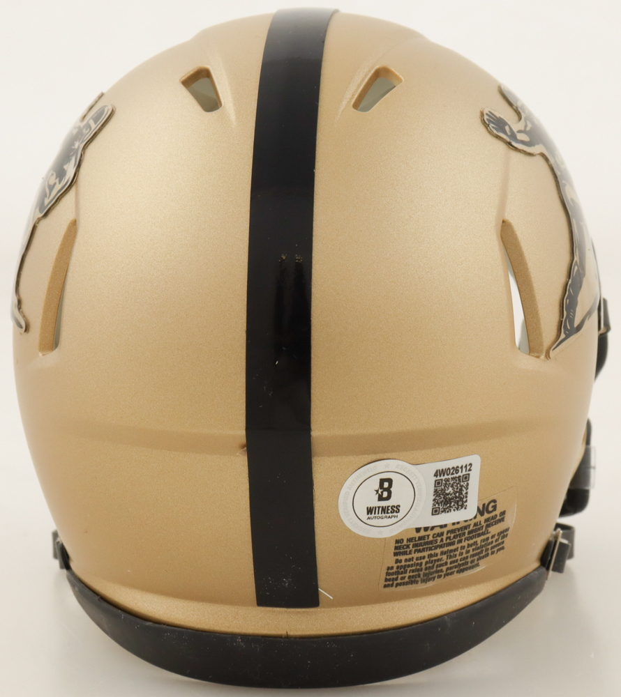 Johnny Manziel Signed Heisman Trophy Logo Speed Mini Helmet Inscribed "Heisman" (Beckett) at PristineAuction.com Johnny Manziel Signed Heisman Trophy Logo Speed Mini Helmet Inscribed "Heisman" (Beckett) at PristineAuction.com