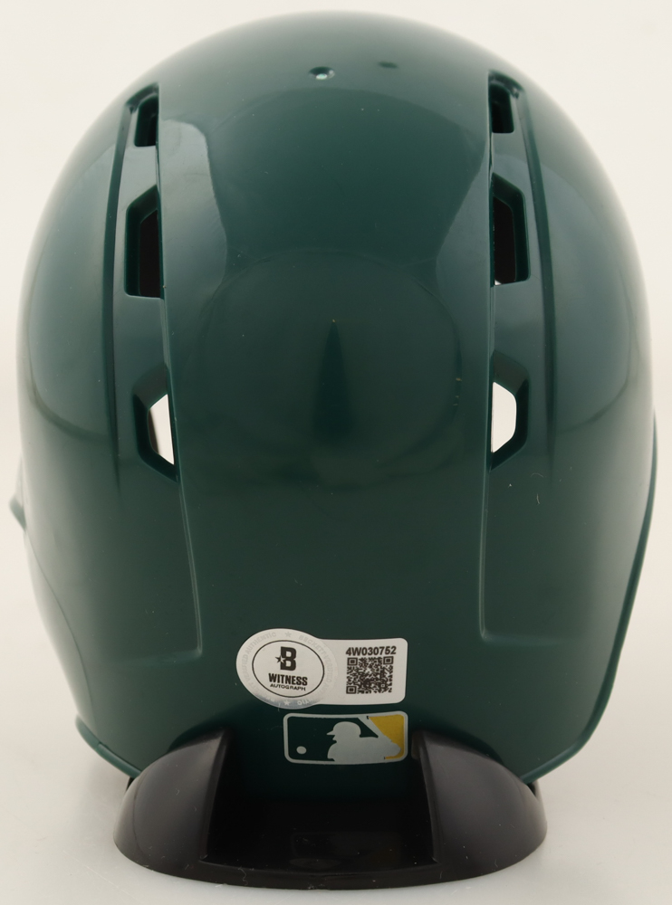 Jose Canseco Signed Athletics Mini Batting Helmet Inscribed "1989 WSC" (Beckett) at PristineAuction.com Jose Canseco Signed Athletics Mini Batting Helmet Inscribed "1989 WSC" (Beckett) at PristineAuction.com