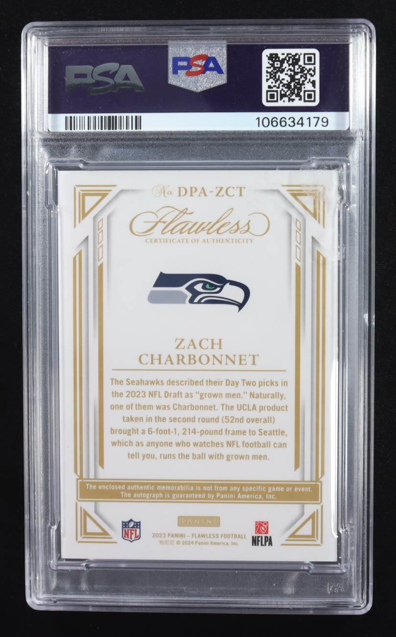 Zach Charbonnet 2023 Panini Flawless Dual Patch Auto Bronze #DPAZCT RC #3/6 (PSA 8 | Autograph Grade 10) at PristineAuction.com Zach Charbonnet 2023 Panini Flawless Dual Patch Auto Bronze #DPAZCT RC #3/6 (PSA 8 | Autograph Grade 10) at PristineAuction.com