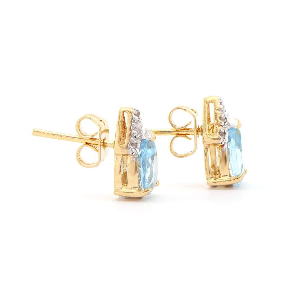 2.73 CTW Natural Blue Topaz & Diamond 18K Gold Plated Designer Earrings  | Estimated Retail Value: $1,149 (AMG) at PristineAuction.com 2.73 CTW Natural Blue Topaz & Diamond 18K Gold Plated Designer Earrings  | Estimated Retail Value: $1,149 (AMG) at PristineAuction.com