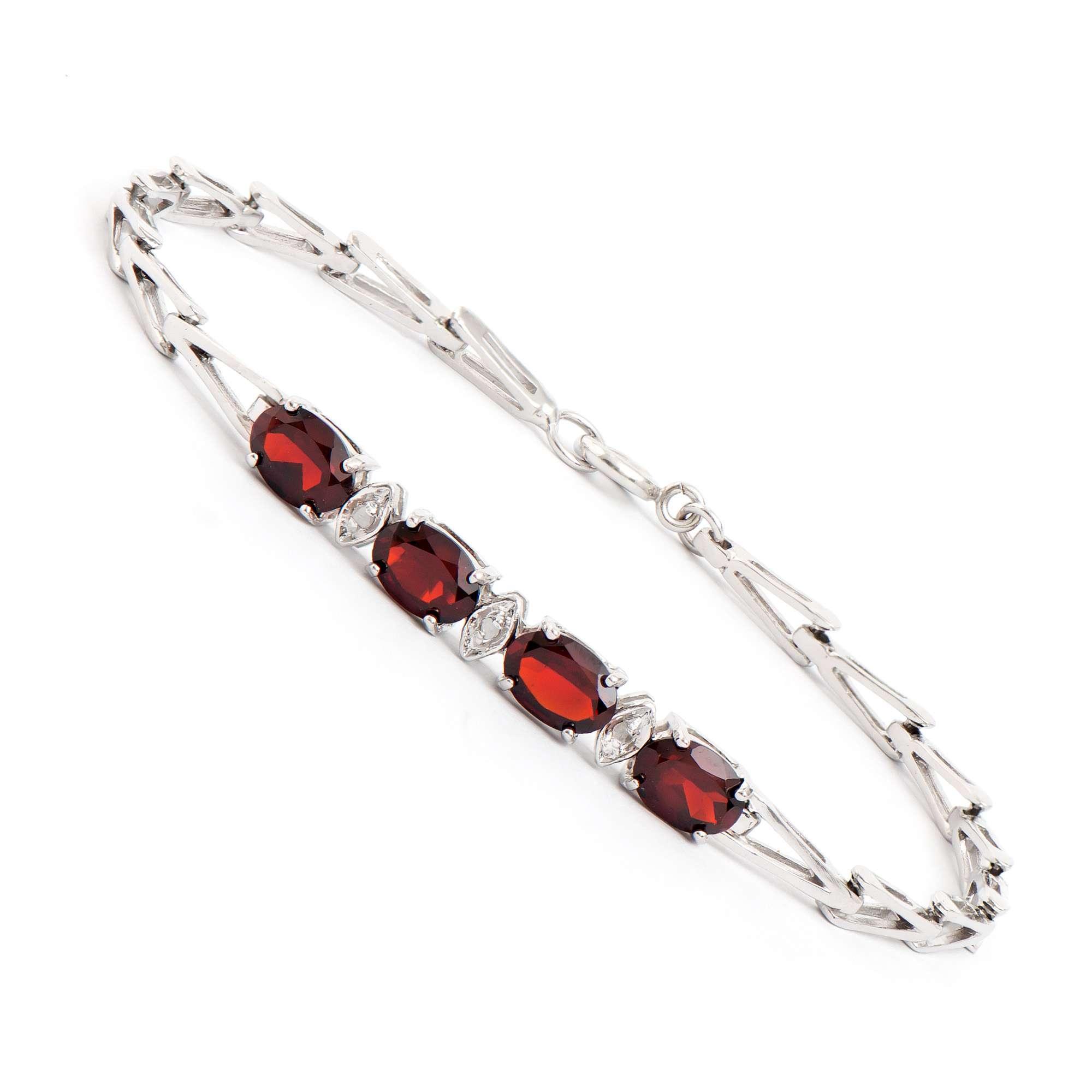 3.35 CTW Natural Garnet & Diamonds Rhodium Plated Designer Bracelet 7.5 in | Estimated Retail Value: $1,999 (AMG) at PristineAuction.com 3.35 CTW Natural Garnet & Diamonds Rhodium Plated Designer Bracelet 7.5 in | Estimated Retail Value: $1,999 (AMG) at PristineAuction.com