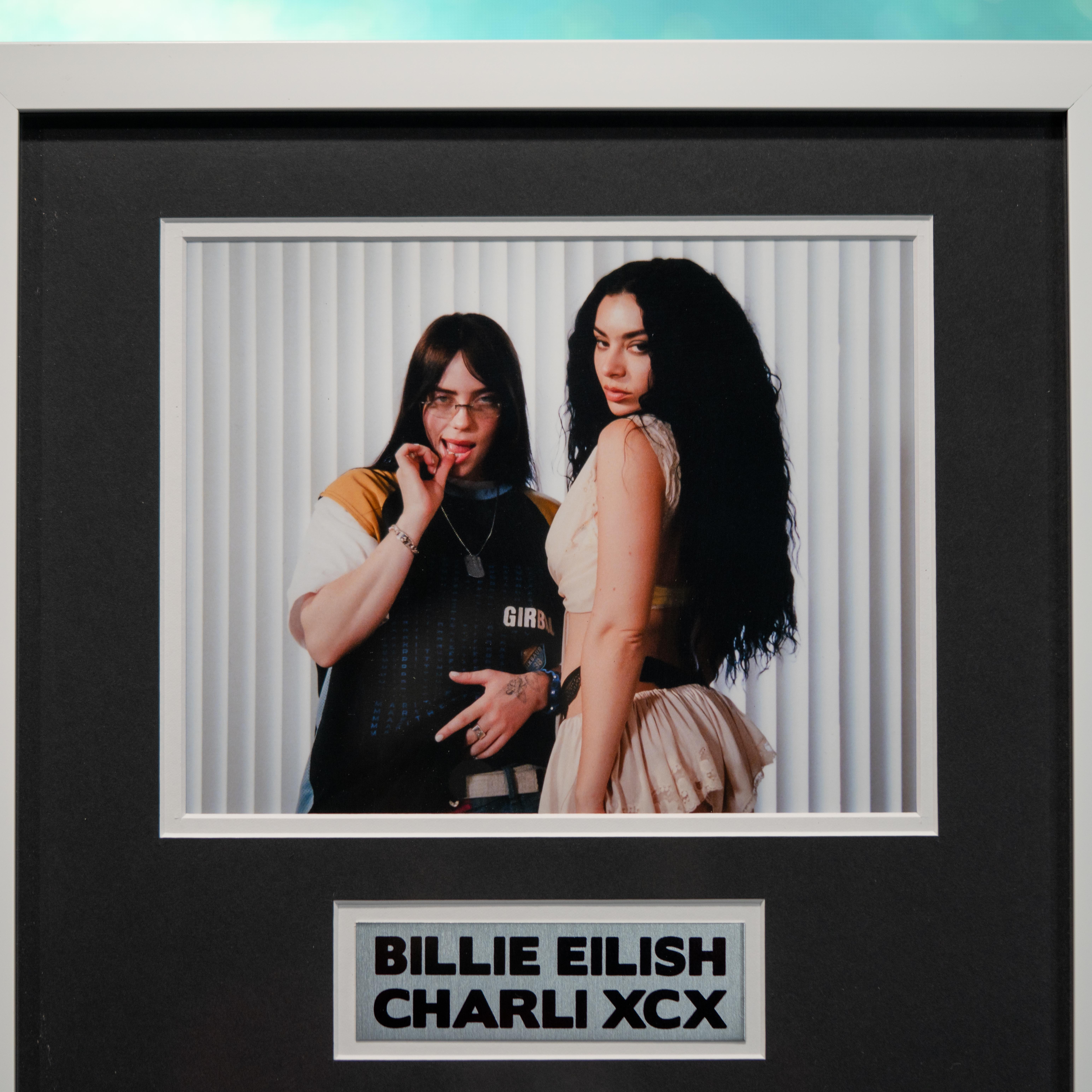 Billie Eilish & Charli XCX Dual-Signed Custom Framed CD Insert Display (ACOA) at PristineAuction.com Billie Eilish & Charli XCX Dual-Signed Custom Framed CD Insert Display (ACOA) at PristineAuction.com