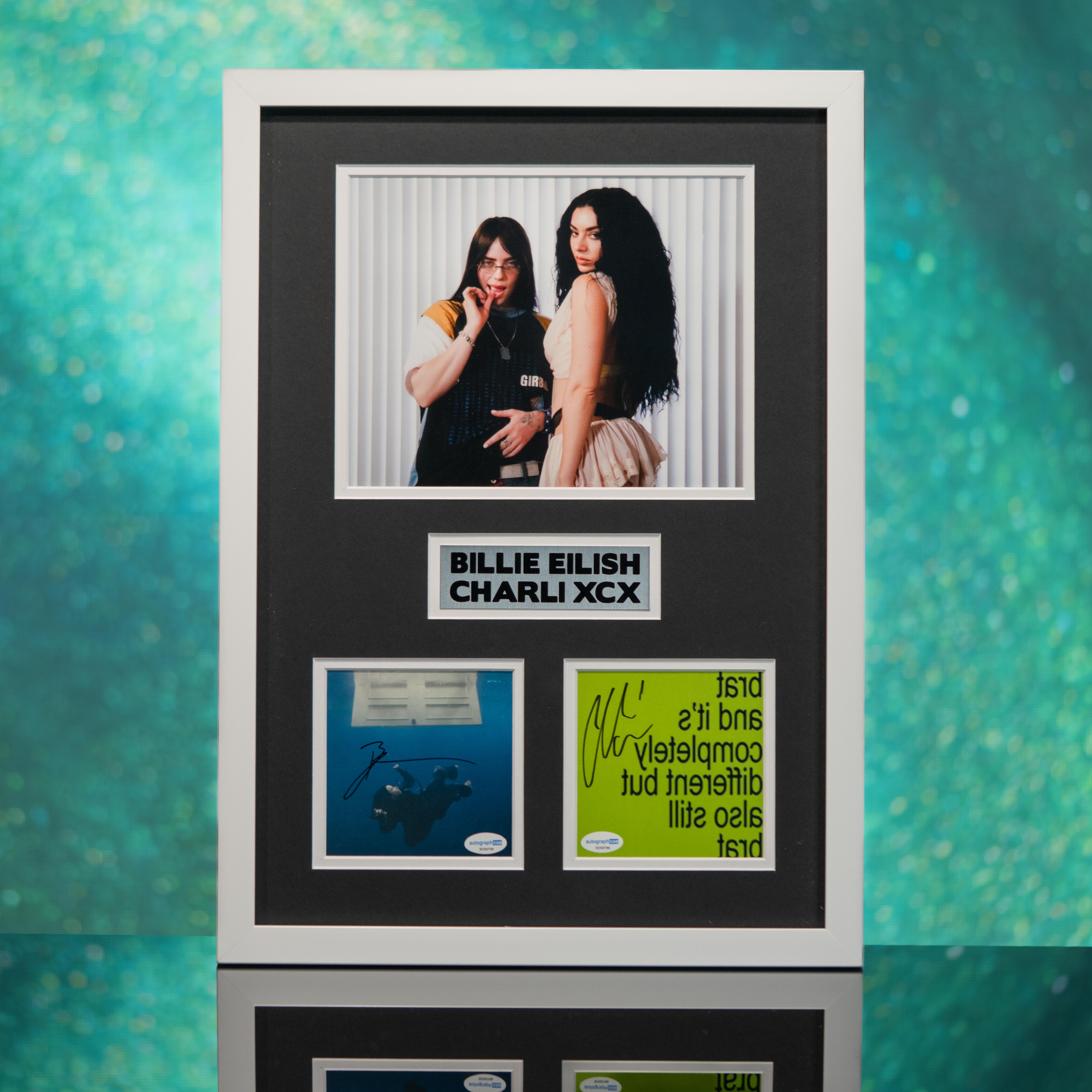 Billie Eilish & Charli XCX Dual-Signed Custom Framed CD Insert Display (ACOA) at PristineAuction.com Billie Eilish & Charli XCX Dual-Signed Custom Framed CD Insert Display (ACOA) at PristineAuction.com