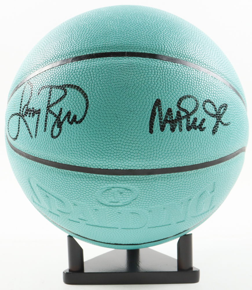 Magic Johnson & Larry Bird Signed Tiffany & Co X Basketball with Display Stand (Beckett & PSA) at PristineAuction.com Magic Johnson & Larry Bird Signed Tiffany & Co X Basketball with Display Stand (Beckett & PSA) at PristineAuction.com