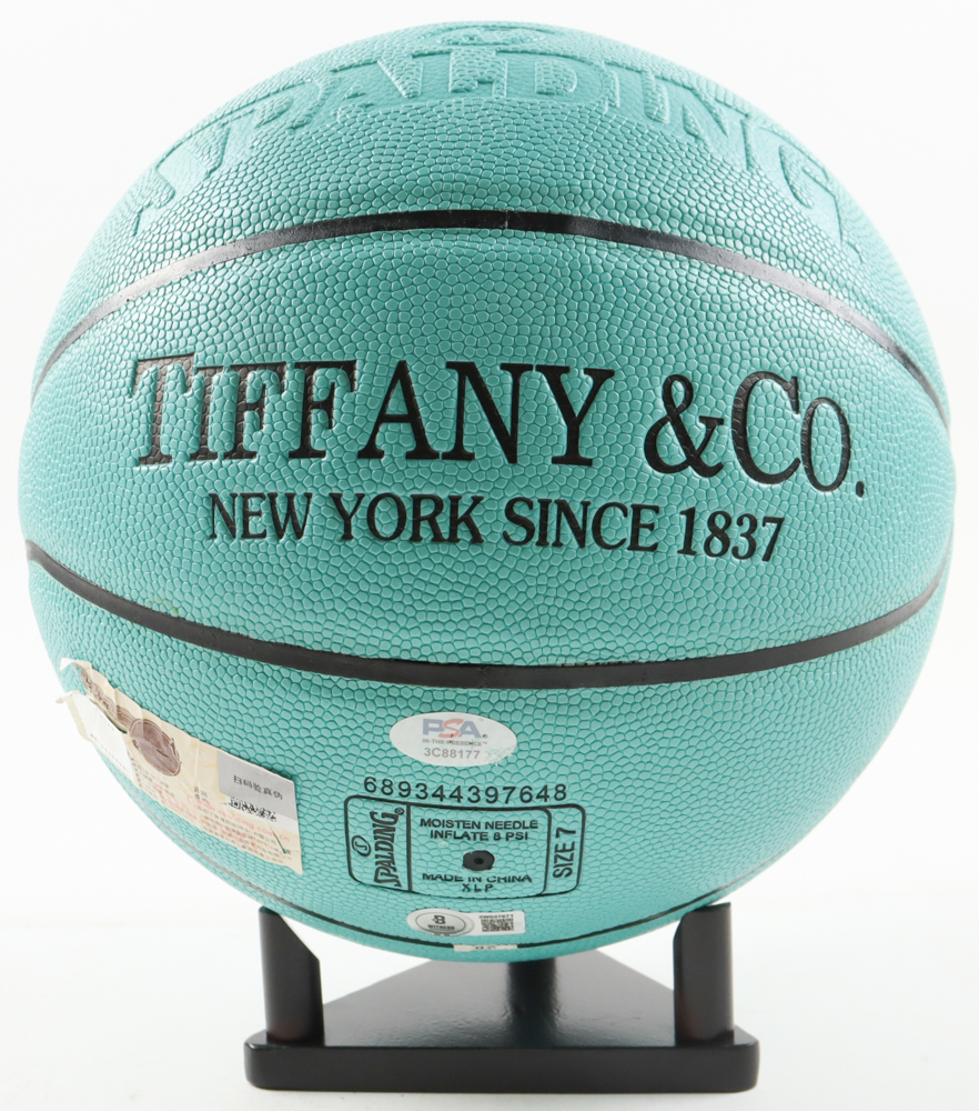 Magic Johnson & Larry Bird Signed Tiffany & Co X Basketball with Display Stand (Beckett & PSA) at PristineAuction.com Magic Johnson & Larry Bird Signed Tiffany & Co X Basketball with Display Stand (Beckett & PSA) at PristineAuction.com