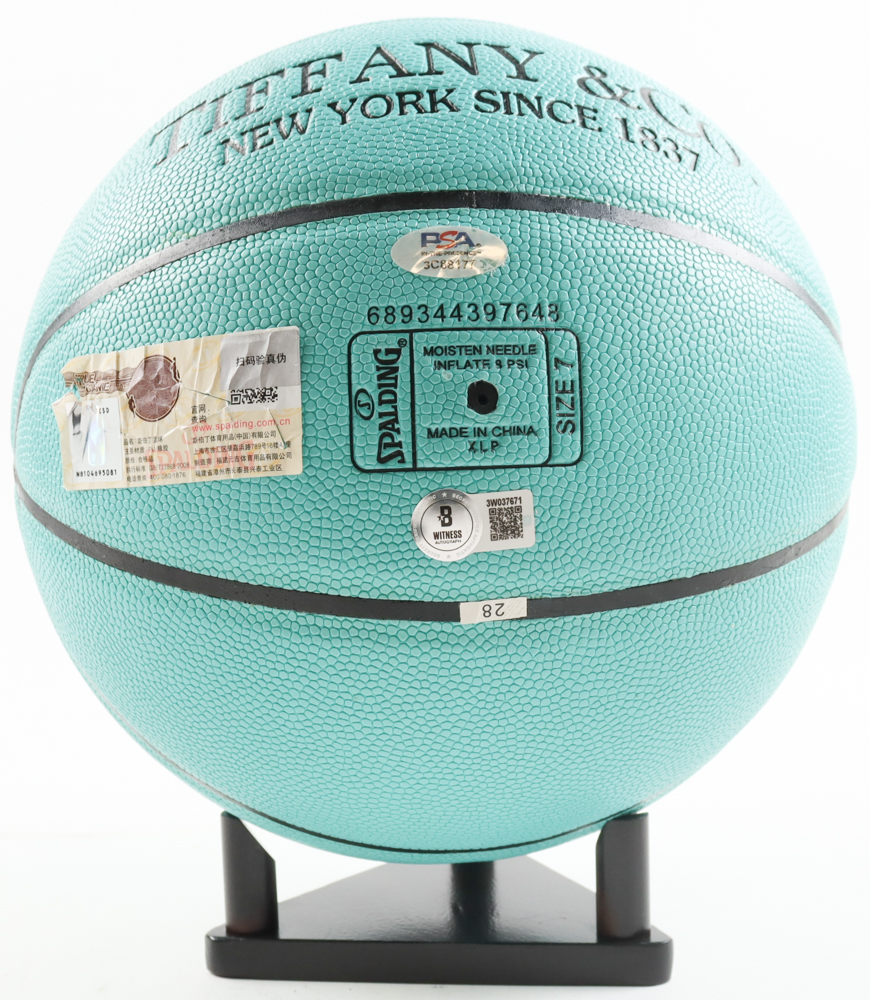 Magic Johnson & Larry Bird Signed Tiffany & Co X Basketball with Display Stand (Beckett & PSA) at PristineAuction.com Magic Johnson & Larry Bird Signed Tiffany & Co X Basketball with Display Stand (Beckett & PSA) at PristineAuction.com