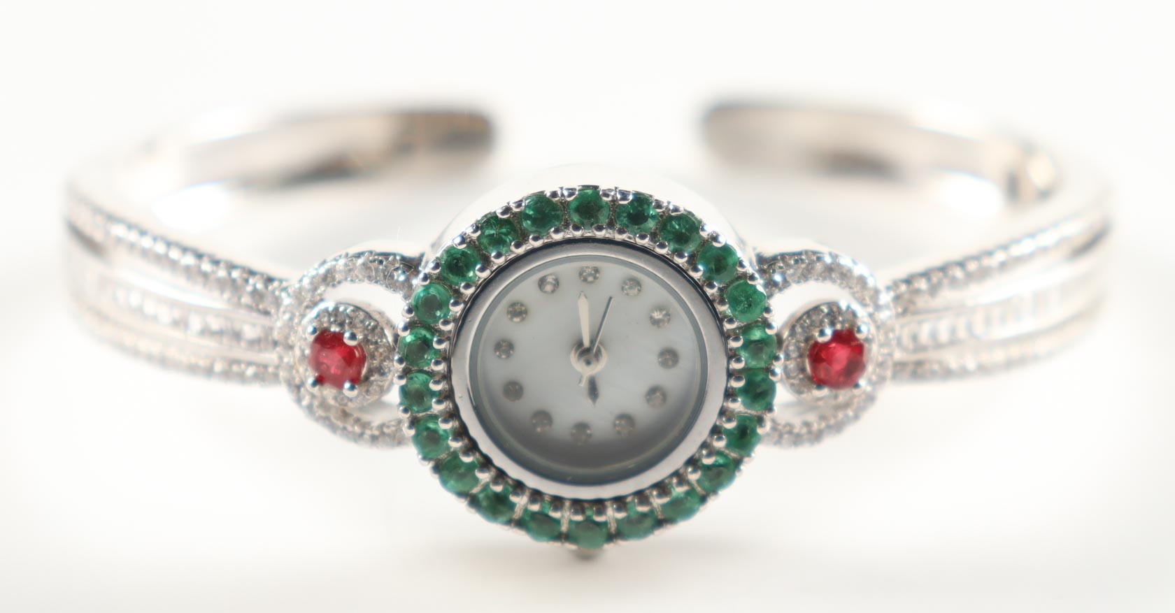 New 4.5 CTW Emerald, Ruby & Zircon Watch | Estimated Retail Value: $2,200 (UGL) at PristineAuction.com New 4.5 CTW Emerald, Ruby & Zircon Watch | Estimated Retail Value: $2,200 (UGL) at PristineAuction.com