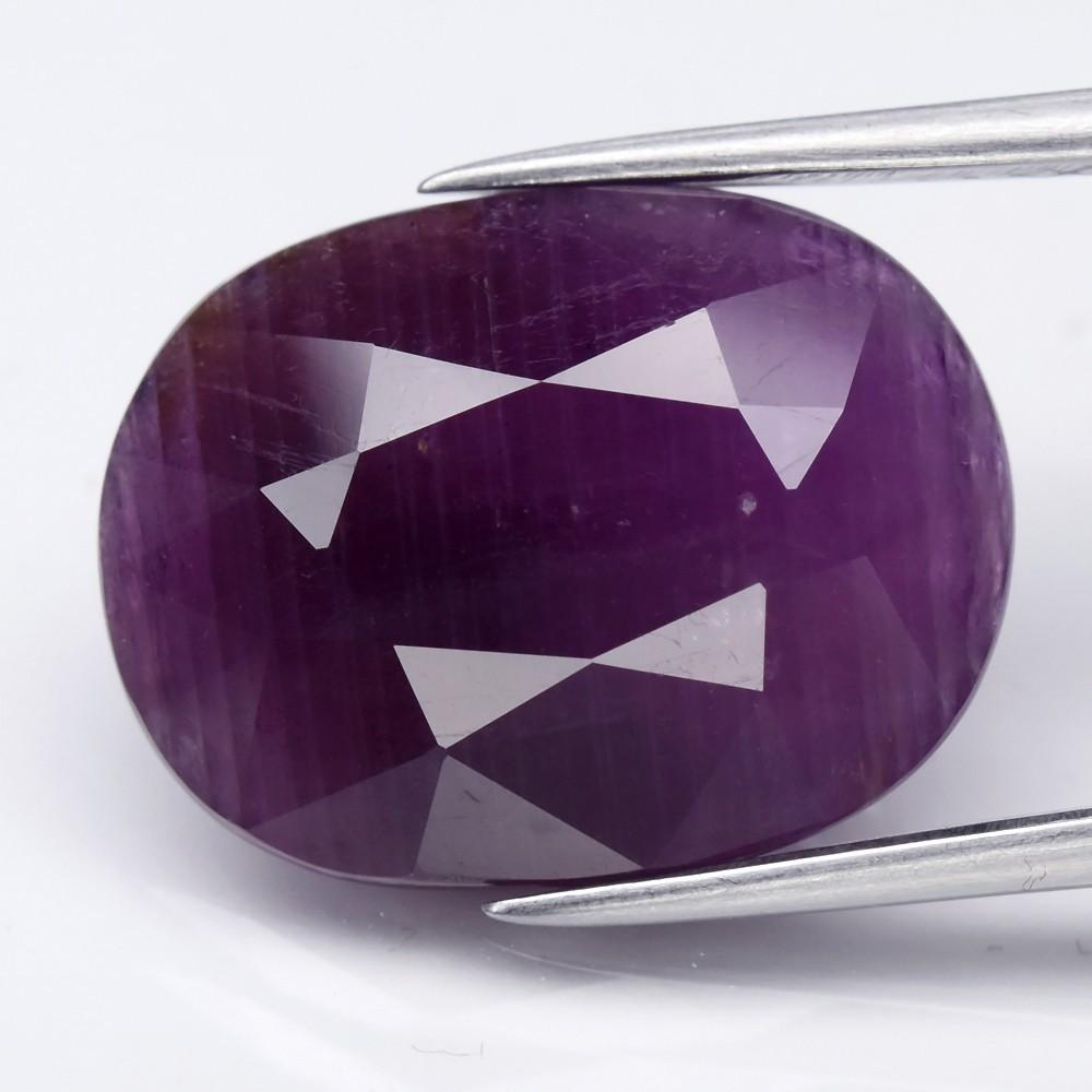 12.13 Carats Loose Reddish Purple Sapphire | Estimated Retail Value: $3,600 (UGL) at PristineAuction.com 12.13 Carats Loose Reddish Purple Sapphire | Estimated Retail Value: $3,600 (UGL) at PristineAuction.com