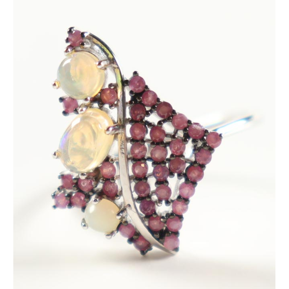 New 1.25 CTW Opal & Ruby Ring | Estimated Retail Value: $1,400 (UGL) at PristineAuction.com New 1.25 CTW Opal & Ruby Ring | Estimated Retail Value: $1,400 (UGL) at PristineAuction.com