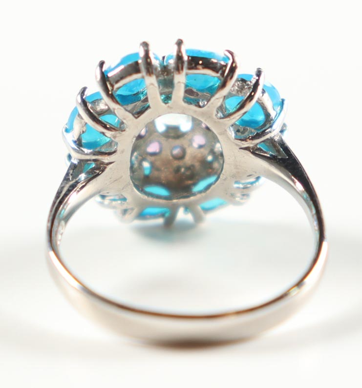 New 2.65 CTW Blue Opal, Tanzanite & White Zircon Ring | Estimated Retail Value: $1,800 (UGL) at PristineAuction.com New 2.65 CTW Blue Opal, Tanzanite & White Zircon Ring | Estimated Retail Value: $1,800 (UGL) at PristineAuction.com