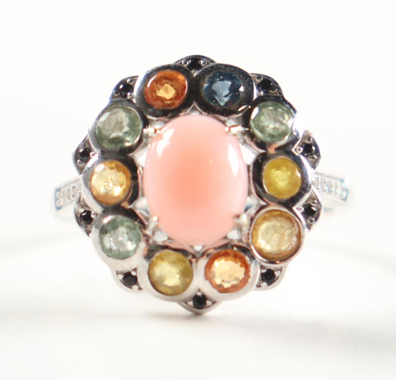 New 3.25 CTW Opal & Sapphire Ring | Estimated Retail Value: $1,850 (UGL) at PristineAuction.com New 3.25 CTW Opal & Sapphire Ring | Estimated Retail Value: $1,850 (UGL) at PristineAuction.com