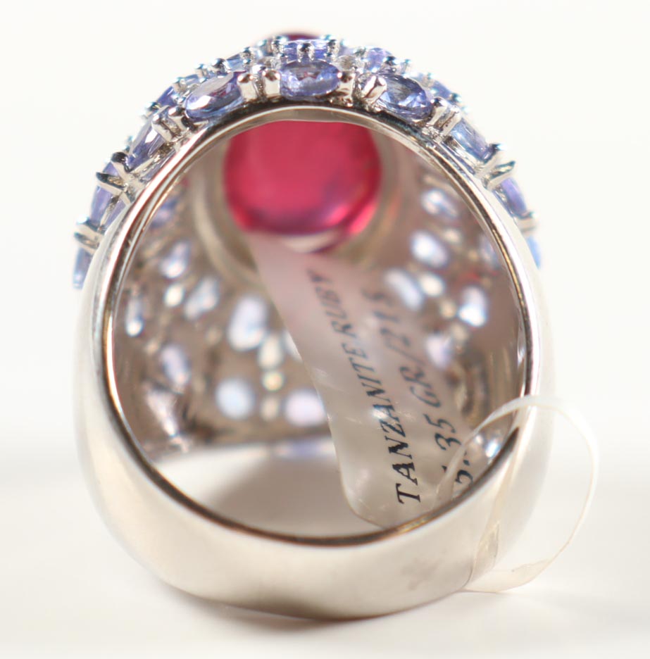 New 17.50 CTW Ruby & Tanzanite Ring | Estimated Retail Value: $4,000 (UGL) at PristineAuction.com New 17.50 CTW Ruby & Tanzanite Ring | Estimated Retail Value: $4,000 (UGL) at PristineAuction.com