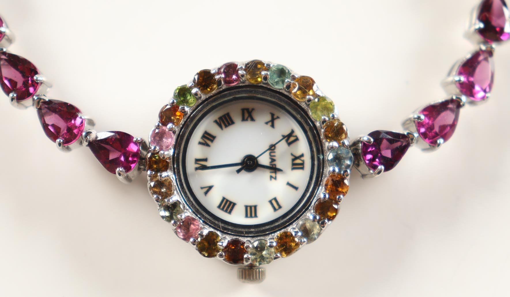 New 16.5 CTW Amethyst & Tourmaline Watch | Estimated Retail Value: $2,400 (UGL) at PristineAuction.com New 16.5 CTW Amethyst & Tourmaline Watch | Estimated Retail Value: $2,400 (UGL) at PristineAuction.com