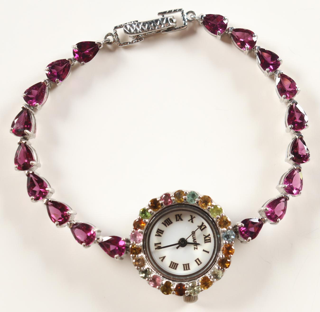 New 16.5 CTW Amethyst & Tourmaline Watch | Estimated Retail Value: $2,400 (UGL) at PristineAuction.com New 16.5 CTW Amethyst & Tourmaline Watch | Estimated Retail Value: $2,400 (UGL) at PristineAuction.com
