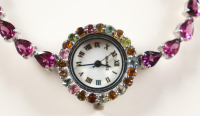 New 16.5 CTW Amethyst & Tourmaline Watch | Estimated Retail Value: $2,400 (UGL) at PristineAuction.com