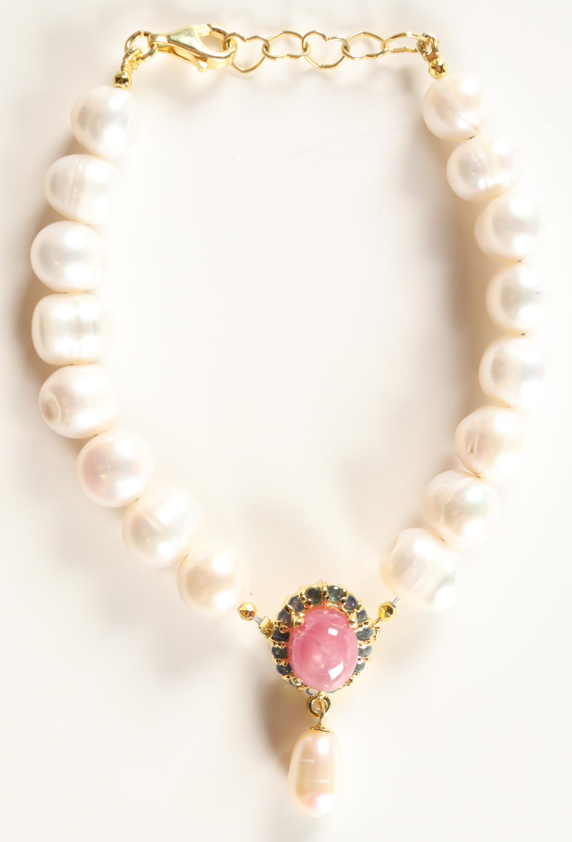 New Freshwater Cultured Pearl Bracelet with 5.50 Carats of Ruby & Sapphire | Estimated Retail Value: $2,200 (UGL) at PristineAuction.com New Freshwater Cultured Pearl Bracelet with 5.50 Carats of Ruby & Sapphire | Estimated Retail Value: $2,200 (UGL) at PristineAuction.com