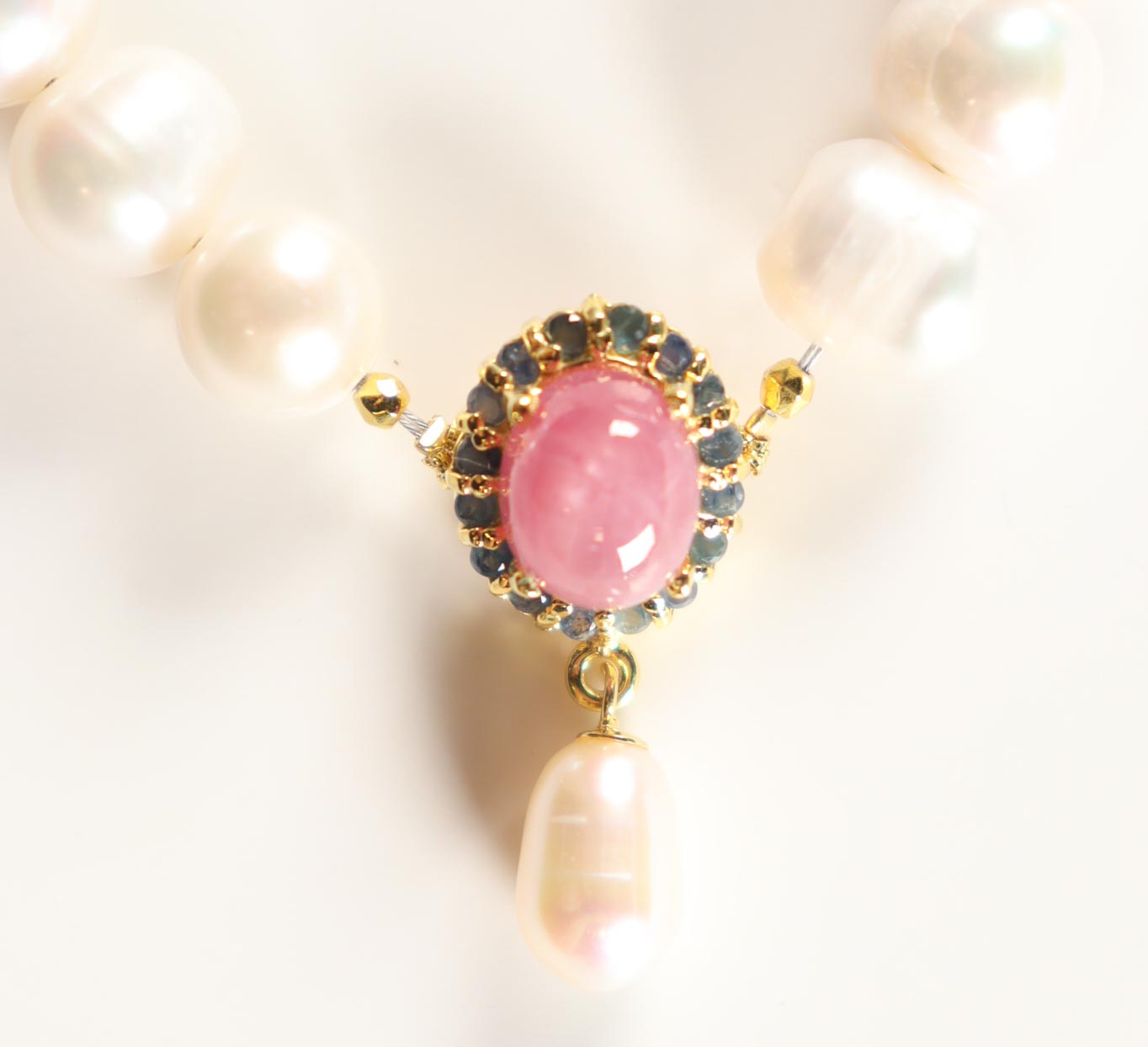 New Freshwater Cultured Pearl Bracelet with 5.50 Carats of Ruby & Sapphire | Estimated Retail Value: $2,200 (UGL) at PristineAuction.com New Freshwater Cultured Pearl Bracelet with 5.50 Carats of Ruby & Sapphire | Estimated Retail Value: $2,200 (UGL) at PristineAuction.com