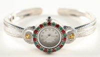New 4.9 CTW Emerald, Ruby & Sapphire Bangle Watch | Estimated Retail Value: $1,800 (UGL) at PristineAuction.com