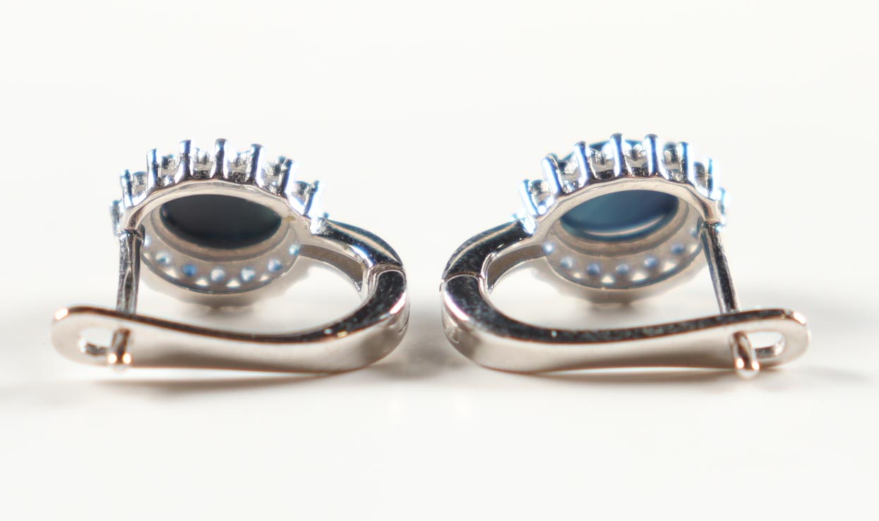 New 2 CTW Pair of Star Sapphire Earrings | Estimated Retail Value: $1,400 (UGL) at PristineAuction.com New 2 CTW Pair of Star Sapphire Earrings | Estimated Retail Value: $1,400 (UGL) at PristineAuction.com