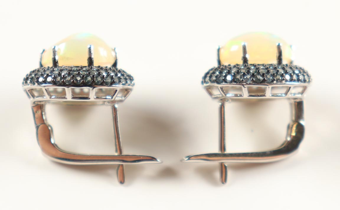 New 4 CTW Pair of Opal & Sapphire Earrings | Estimated Retail Value: $1,700 (UGL) at PristineAuction.com New 4 CTW Pair of Opal & Sapphire Earrings | Estimated Retail Value: $1,700 (UGL) at PristineAuction.com