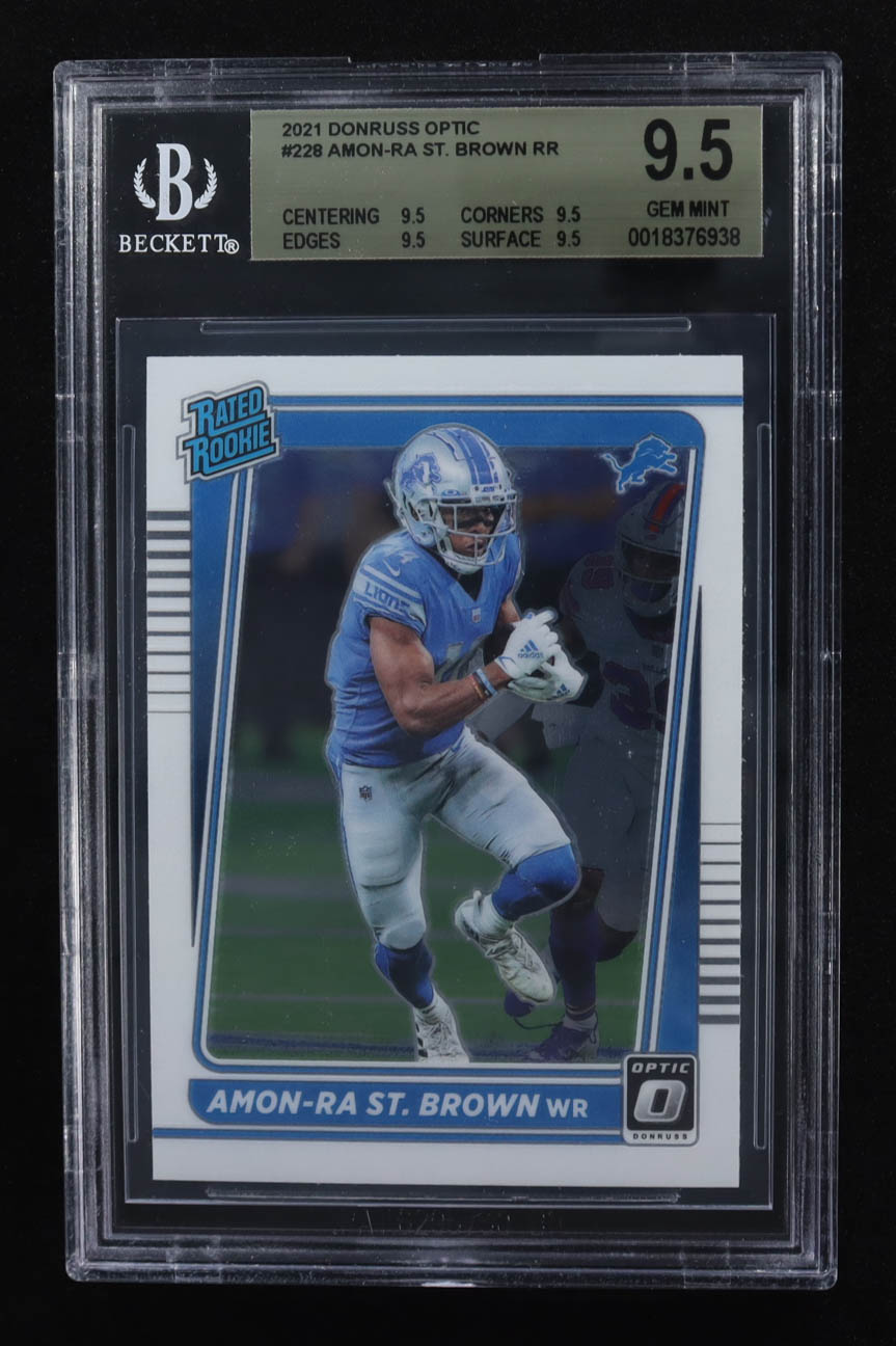 Amon-Ra St. Brown 2021 Donruss Optic #228 RR RC (BGS 9.5) at PristineAuction.com Amon-Ra St. Brown 2021 Donruss Optic #228 RR RC (BGS 9.5) at PristineAuction.com