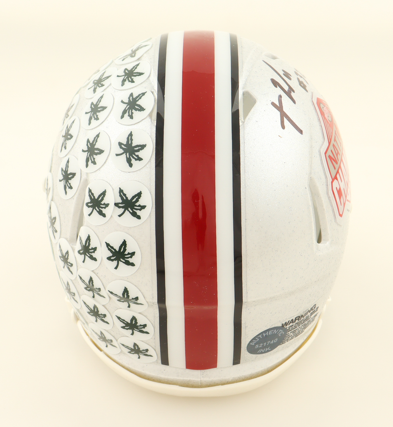 TreVeyon Henderson Signed Ohio State Buckeyes 2024 National Champions Logo Speed Mini Helmet (Authentic Ink) at PristineAuction.com TreVeyon Henderson Signed Ohio State Buckeyes 2024 National Champions Logo Speed Mini Helmet (Authentic Ink) at PristineAuction.com