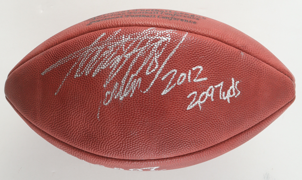 O. J. Simpson & Adrian Peterson Signed NFL Football Inscribed "2003 YDJ" & "2012 2,097yds" (Mounted Memories) at PristineAuction.com O. J. Simpson & Adrian Peterson Signed NFL Football Inscribed "2003 YDJ" & "2012 2,097yds" (Mounted Memories) at PristineAuction.com