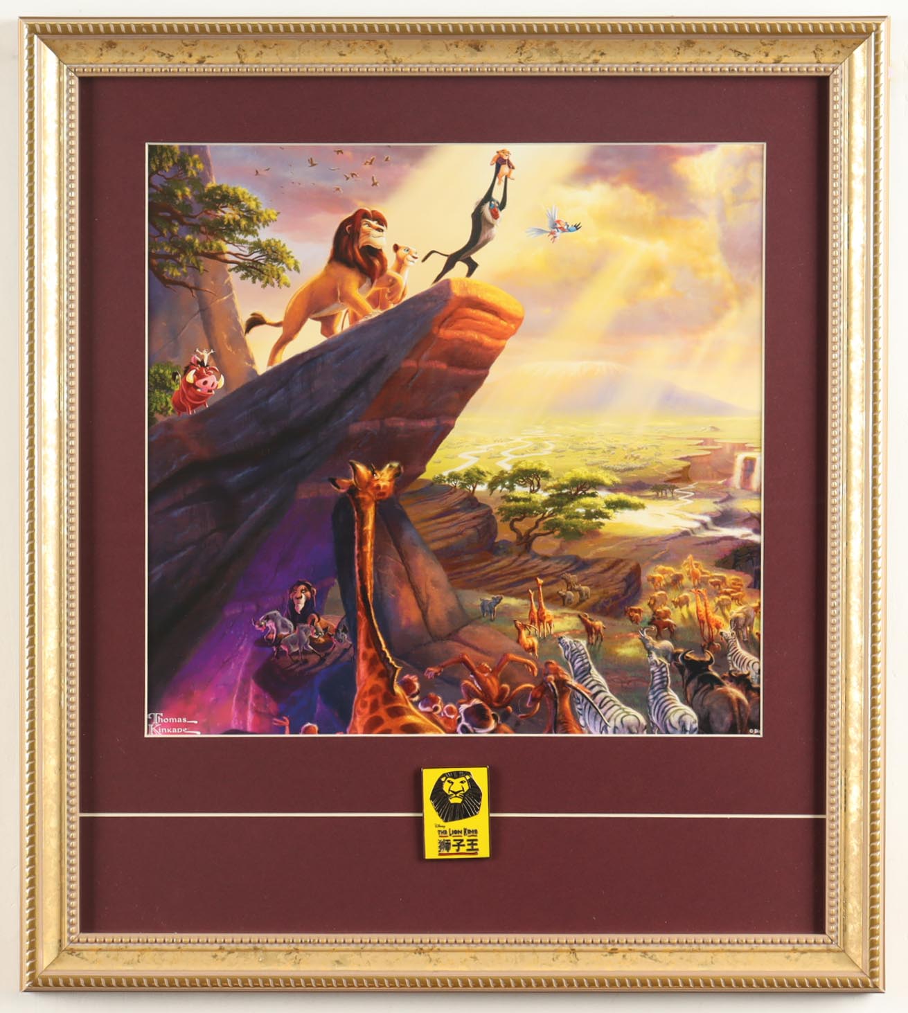 Thomas Kinkade "The Lion King On Pride Rock" Custom Framed Print Display with China Only Lion King Pin at PristineAuction.com Thomas Kinkade "The Lion King On Pride Rock" Custom Framed Print Display with China Only Lion King Pin at PristineAuction.com
