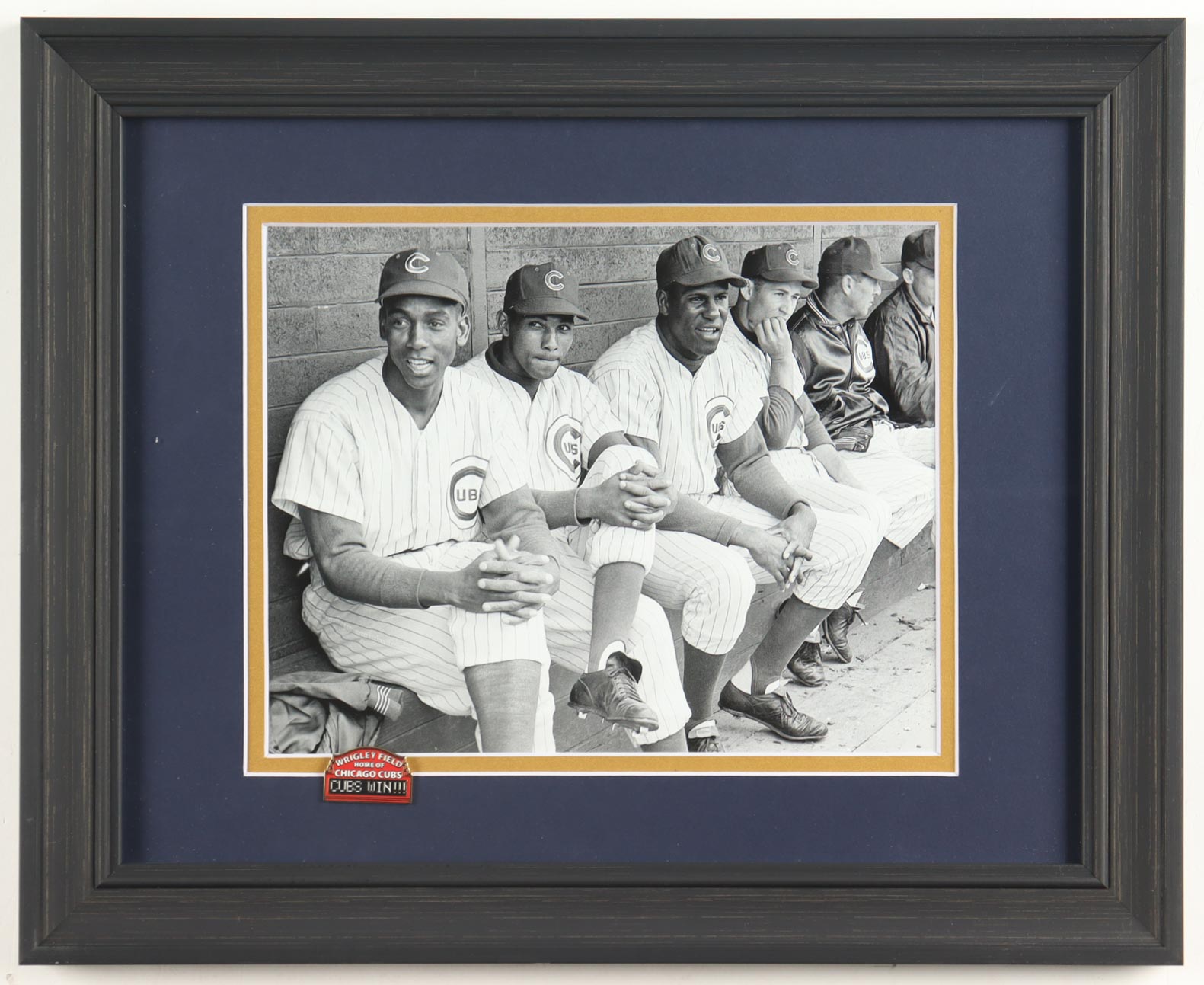 "Ernie Banks, Ron Santon & Billy Williams in The Dugout At Wrigley Field" Custom Framed Art Print Display with Wrigley Field Pin at PristineAuction.com "Ernie Banks, Ron Santon & Billy Williams in The Dugout At Wrigley Field" Custom Framed Art Print Display with Wrigley Field Pin at PristineAuction.com