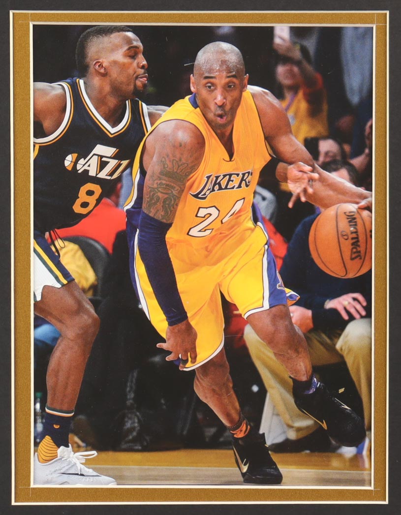 Kobe Bryant Custom Framed Jersey Display with (4) NBA Finals Pins & (2) Team Logo Patches at PristineAuction.com Kobe Bryant Custom Framed Jersey Display with (4) NBA Finals Pins & (2) Team Logo Patches at PristineAuction.com