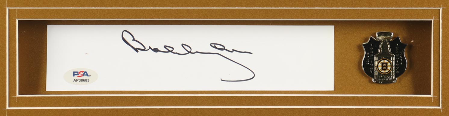 Bobby Orr Signed Custom Framed Cut Display with Jersey, Stanley Cup Champions Pin & (2) Cloth Team Logo Patches (PSA) at PristineAuction.com Bobby Orr Signed Custom Framed Cut Display with Jersey, Stanley Cup Champions Pin & (2) Cloth Team Logo Patches (PSA) at PristineAuction.com