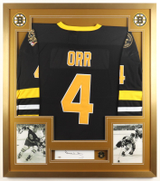 Bobby Orr Signed Custom Framed Cut Display with Jersey, Stanley Cup Champions Pin & (2) Cloth Team Logo Patches (PSA) at PristineAuction.com