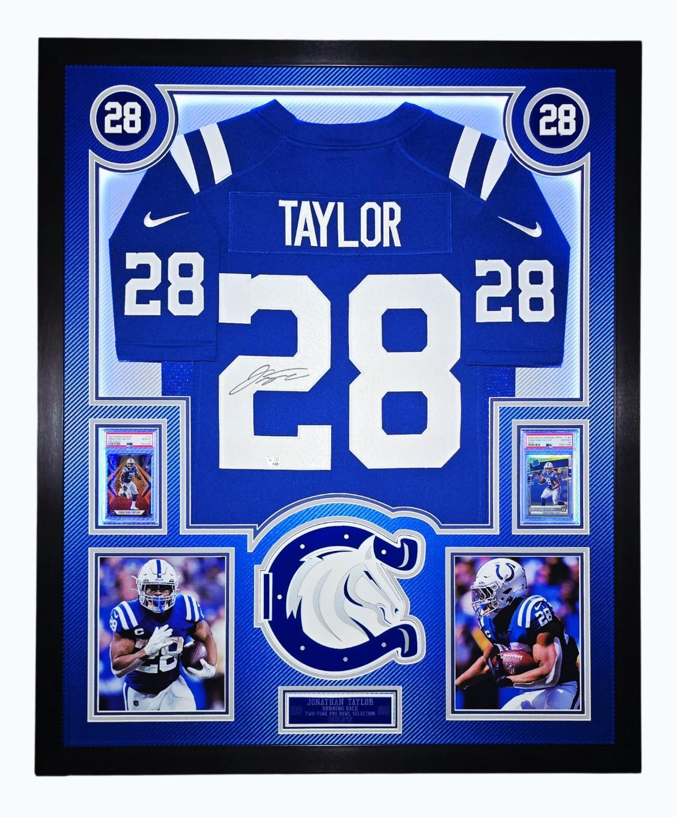 Jonathon Taylor Signed Colts Custom Framed LED Backlit Nike Jersey Display & (2) PSA 10 Graded Rookie Cards (Fanatics) at PristineAuction.com Jonathon Taylor Signed Colts Custom Framed LED Backlit Nike Jersey Display & (2) PSA 10 Graded Rookie Cards (Fanatics) at PristineAuction.com