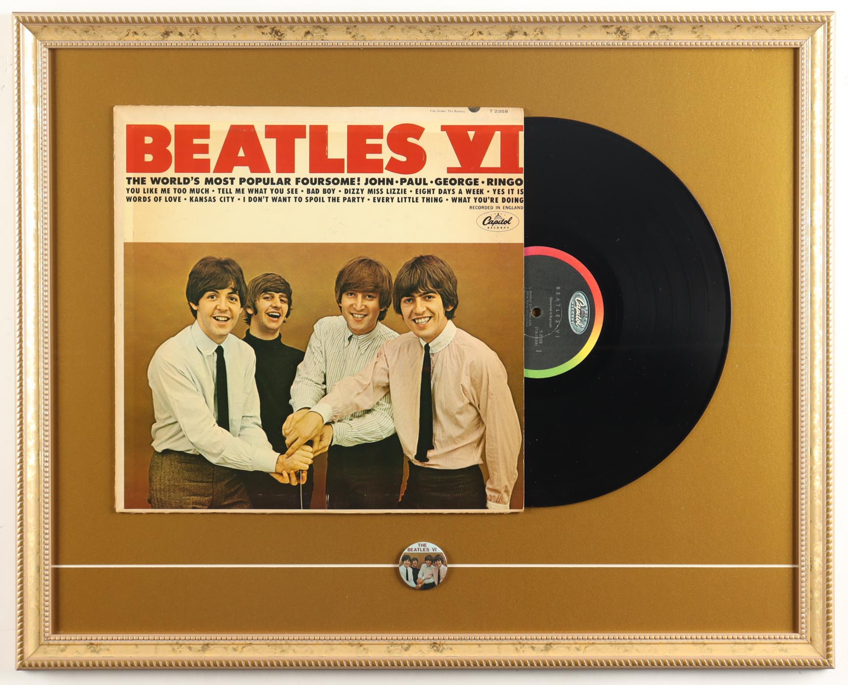 The Beatles "The Beatles VI" Custom Framed Vintage Vinyl LP Album with Record & Lapel Pin at PristineAuction.com The Beatles "The Beatles VI" Custom Framed Vintage Vinyl LP Album with Record & Lapel Pin at PristineAuction.com
