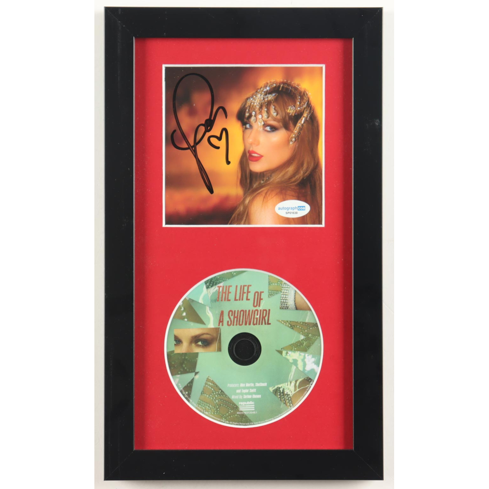 Taylor Swift Signed "The Life of a Showgirl" Custom Framed CD Insert Display (ACOA) at PristineAuction.com Taylor Swift Signed "The Life of a Showgirl" Custom Framed CD Insert Display (ACOA) at PristineAuction.com
