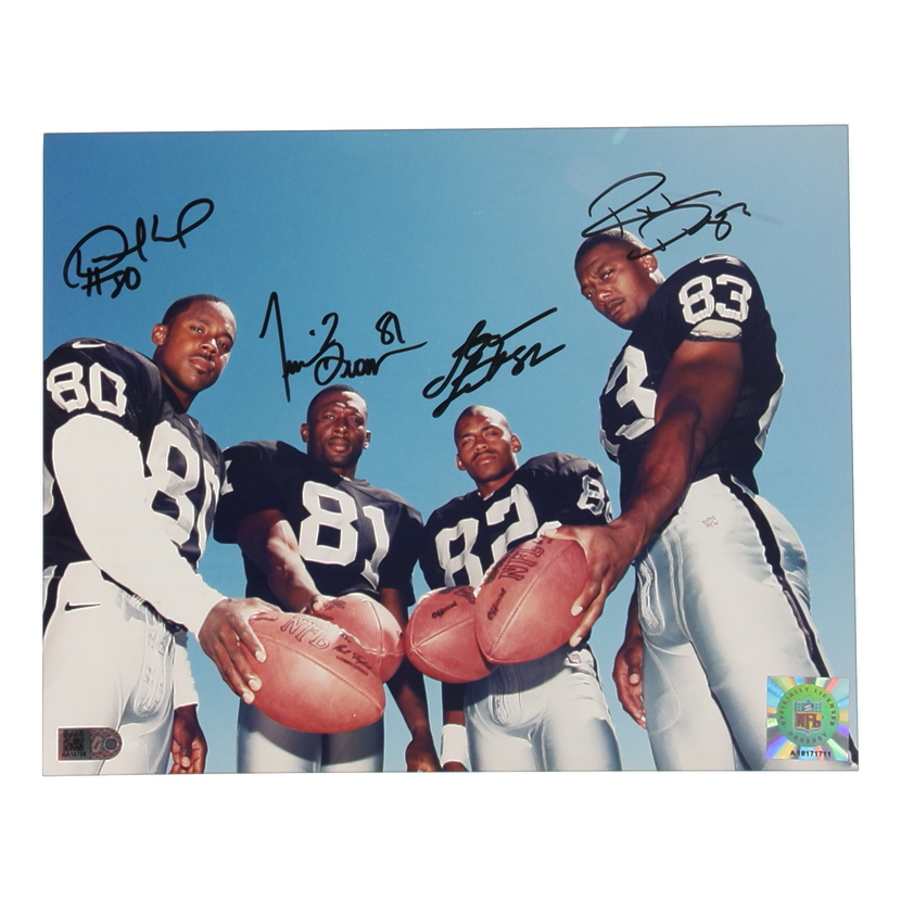 Raiders 8x10 Photo Signed By (4) with Tim Brown, Desmond Howard, Rickey Dudley & James Jett (AIV) at PristineAuction.com Raiders 8x10 Photo Signed By (4) with Tim Brown, Desmond Howard, Rickey Dudley & James Jett (AIV) at PristineAuction.com