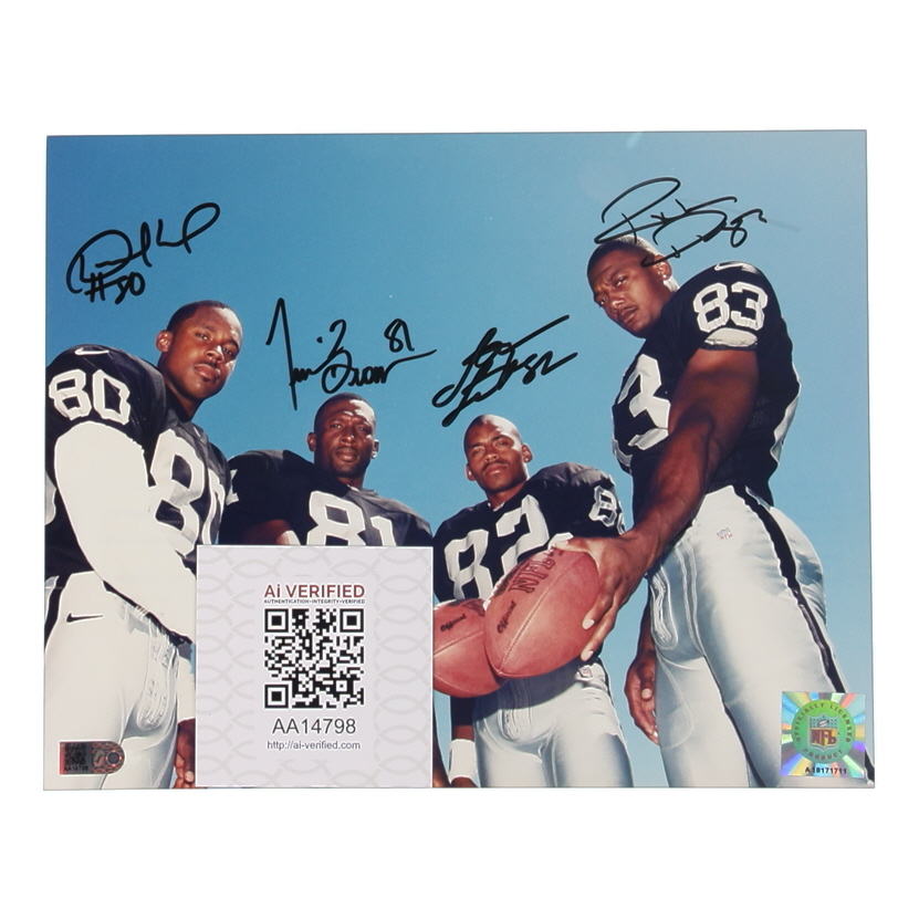 Raiders 8x10 Photo Signed By (4) with Tim Brown, Desmond Howard, Rickey Dudley & James Jett (AIV) at PristineAuction.com Raiders 8x10 Photo Signed By (4) with Tim Brown, Desmond Howard, Rickey Dudley & James Jett (AIV) at PristineAuction.com