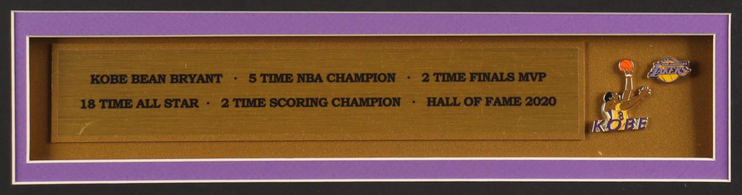 Kobe Bryant Custom Framed Jersey Display with (2) Kobe Pins & Career Stat Plaque at PristineAuction.com Kobe Bryant Custom Framed Jersey Display with (2) Kobe Pins & Career Stat Plaque at PristineAuction.com