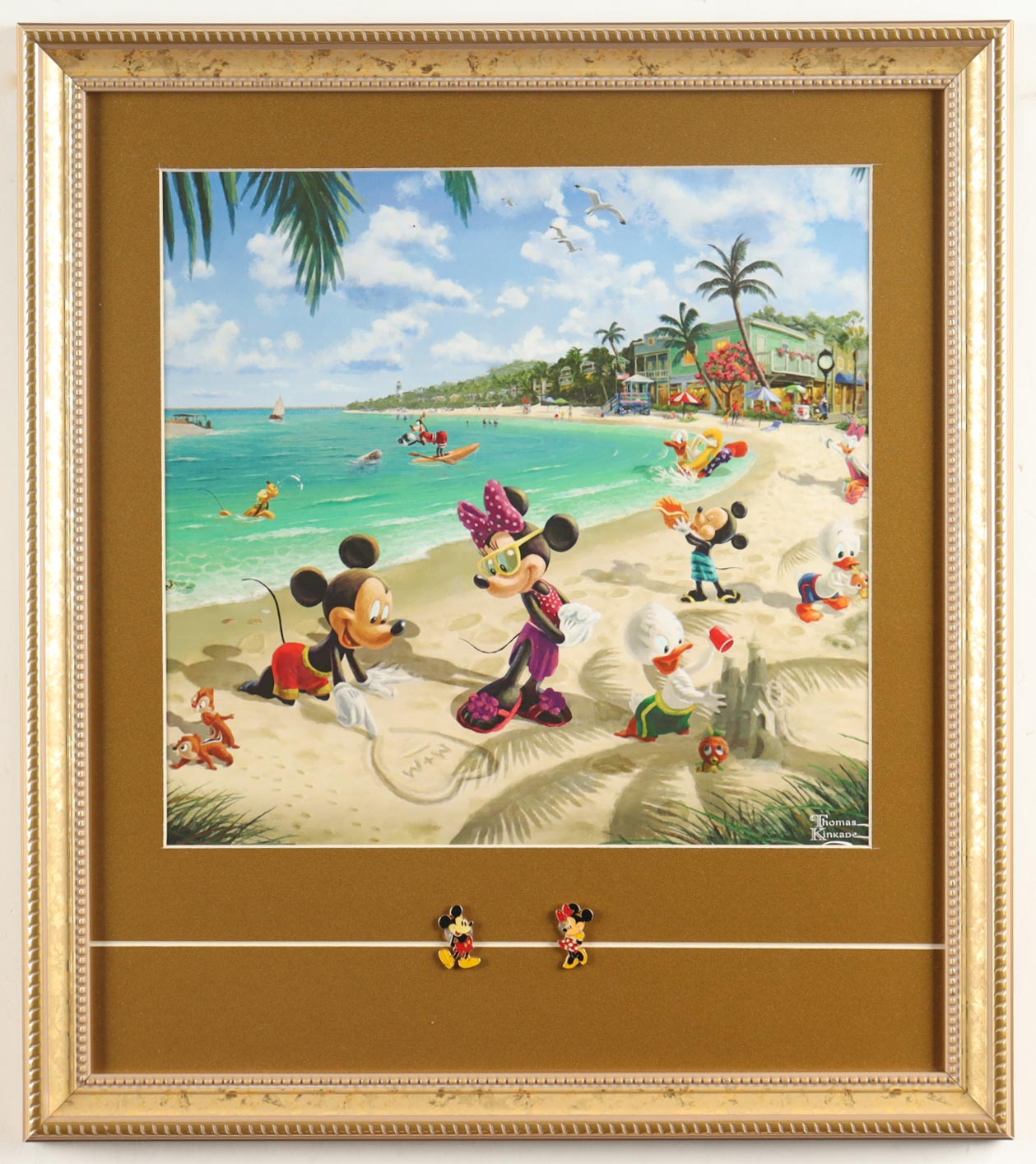 Thomas Kinkade "Mickey & Minnie Mouse on the Florida Beach" Custom Framed Print Display with Vintage Mickey & Minnie Pins at PristineAuction.com Thomas Kinkade "Mickey & Minnie Mouse on the Florida Beach" Custom Framed Print Display with Vintage Mickey & Minnie Pins at PristineAuction.com