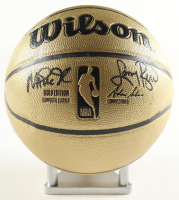Magic Johnson & Larry Bird Signed NBA Gold Edition Basketball with Silver Wood Display Stand (PSA & Beckett) at PristineAuction.com