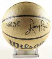 Magic Johnson & Larry Bird Signed NBA Gold Edition Basketball with Silver Wood Display Stand (PSA & Beckett) at PristineAuction.com