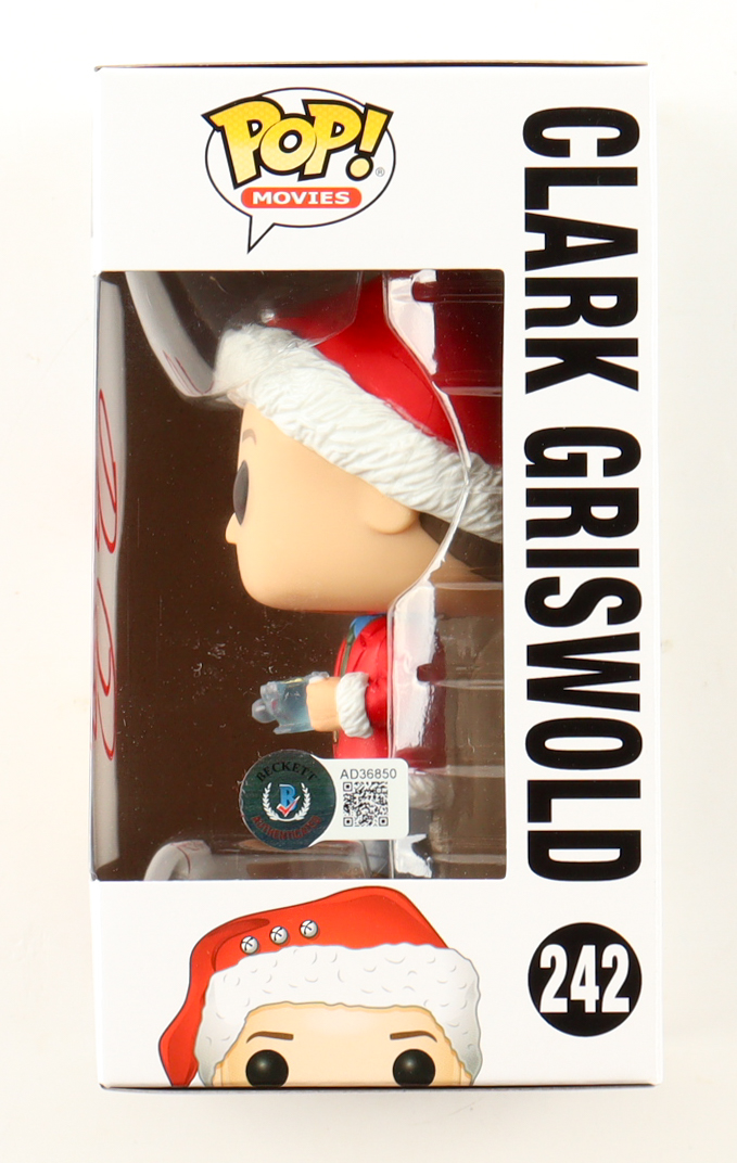 Chevy Chase Signed "National Lampoon's Christmas Vacation" #242 Clark Griswold Funko Pop! Vinyl Figure (Beckett) at PristineAuction.com Chevy Chase Signed "National Lampoon's Christmas Vacation" #242 Clark Griswold Funko Pop! Vinyl Figure (Beckett) at PristineAuction.com
