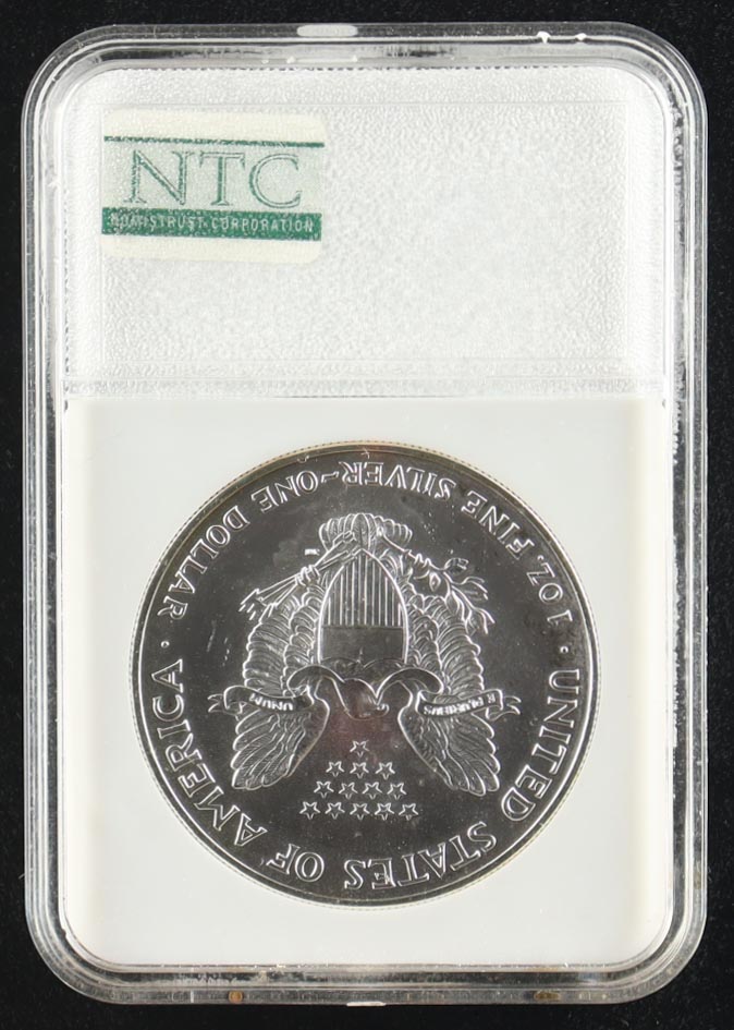 2001 Silver Eagle 1oz. Pure Silver $1 Dollar Coin / Recovered at WTC Ground Zero (NTC) at PristineAuction.com 2001 Silver Eagle 1oz. Pure Silver $1 Dollar Coin / Recovered at WTC Ground Zero (NTC) at PristineAuction.com